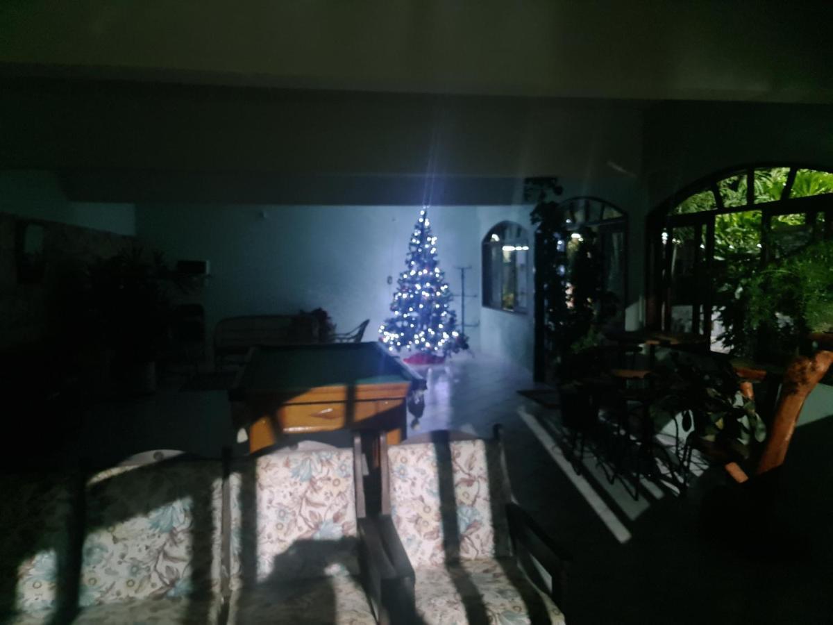 Pousada Nossa Senhora Penedo Kültér fotó A Christmas tree in a house in the Philippines